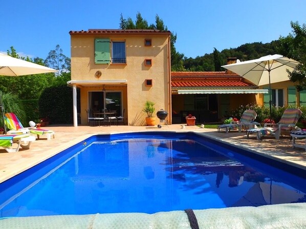 View of the house from the far end of the pool