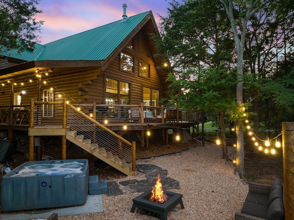 Private hot tub and fire pit in back patio area