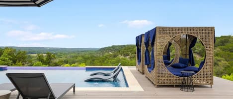 The spectacular pool offers ample opportunity to take in the views of Texas Hill Country. Take your pick of relaxation options!
