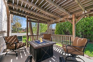 Covered Patio | BBQ Grill and Fire Table with Lounge Chairs