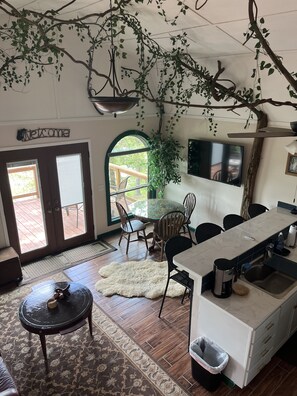 View of kitchen/living area from loft