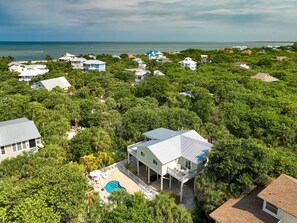 Only five houses back from the sandy beaches. 