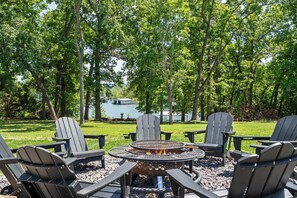 Shared fire pit in your backyard! (There are 2 fire pits shared between 4 homes).