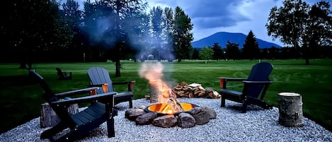 Enjoy outdoors with a firepit and golf course views