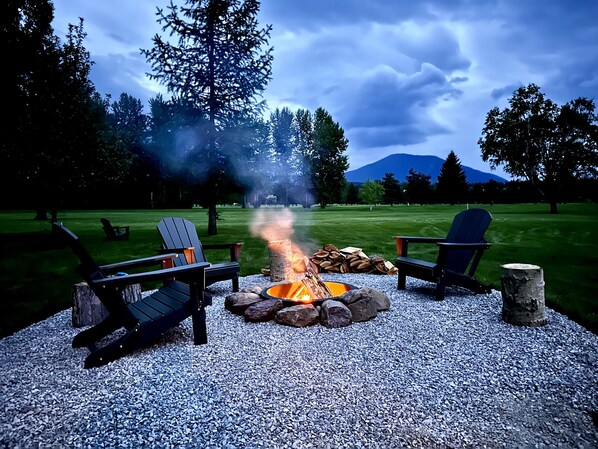 Enjoy outdoors with a firepit and golf course views