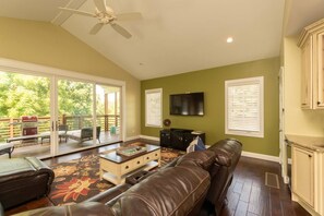 Open great room with huge sliders to the second floor deck overlooking the rural setting