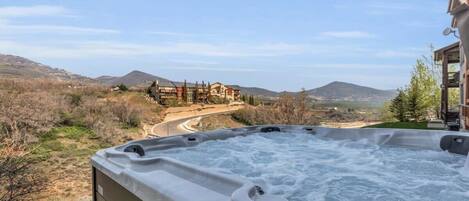 Loosen up amid the bubbles in a hot tub with panoramic mountain views.