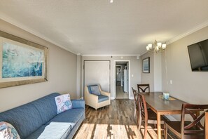 Living Room | Free WiFi | Flat-Screen TV | Window A/C Unit | Queen Sleeper Sofa