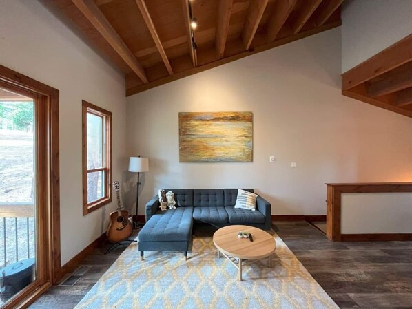 The living room has a Smart TV,  and balcony. Great for entertaining and lounging after a long day of exploring!