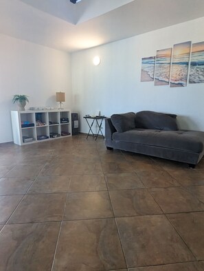 Spacious open concept living room with vaulted ceiling.