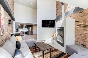 Living Area w/ Fireplace and TV