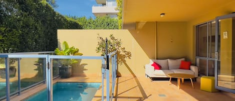 The Garden Apartment's Private Outdoor Courtyard and Pool