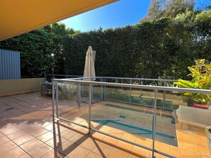 The Garden Apartment's Private Outdoor Courtyard and Pool