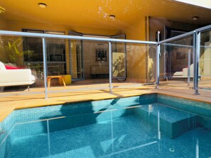 The Garden Apartment's Private Outdoor Courtyard and Pool