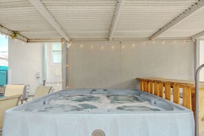 Indulge in pure relaxation in our luxurious hot tub.