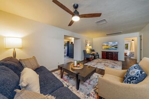 Large living room space with 55" smart TV