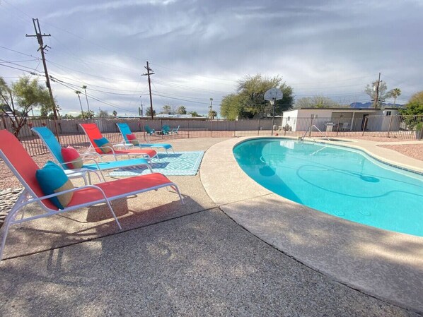 Private pool (unheated), hot tub (heated w/ fee), and seating