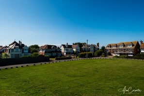 The private green in front of the house, from the sea wall.