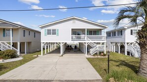 Cherry Grove's Oasis is a raised beach house. 