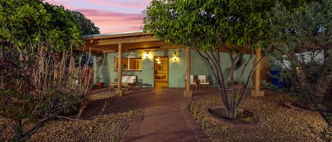 Front entrance of home with private, fully fenced front and backyard