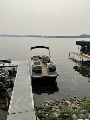 Sandy bottom for swimming right off the dock. Kayaks and floating mat available.