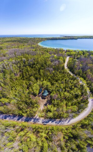 Aerial view of house.  Lake Esau and Lake Huron are close by. 