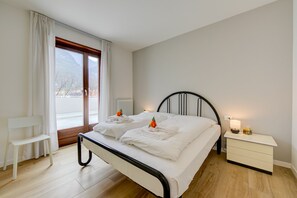 The master bedroom with access to the terrace