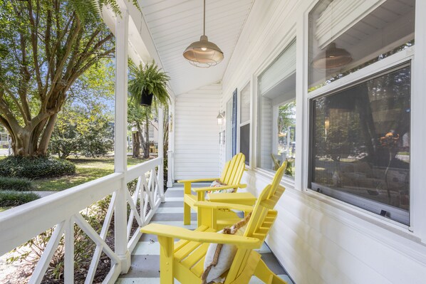 Shaded front porch.  People watching at it's best.  