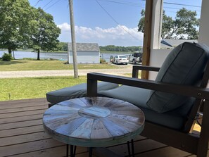 Relax in the farmer’s porch with water views