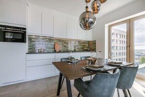 Open kitchen with diningtable