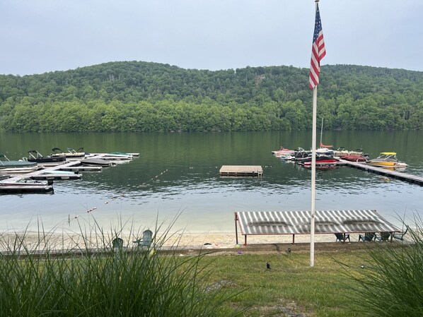 Enjoy the lake, swim area, sandy beach, beach chairs,  new bathrooms