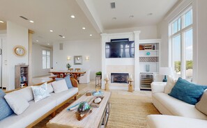 Living room view with smart tv and wine fridge - third floor