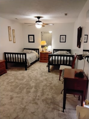 Twin bedroom is rather open; has room darkening drape for separation
