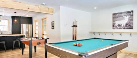 Game room, with pool table and foosball