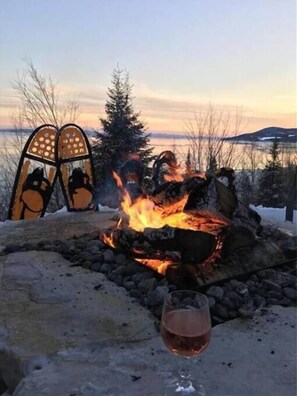 Outdoor fireplace with view