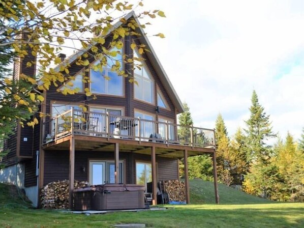 Outside view of the cottage with spa