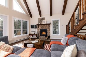 Living room with indoor fireplace