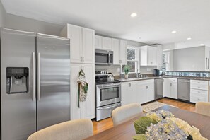 Who's the chef? A full kitchen with new oven awaits.