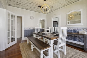 Restored wooden ceilings frame this quaint southern dining room. Bon appetit!