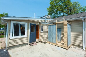 Sun porch entrance and newly renovated outdoor shower