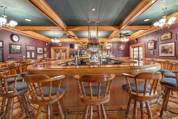 Cheers to a great stay: our resort bar is the perfect place to unwind.