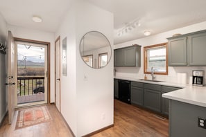 Kitchen with Front Door in Background