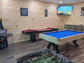 Play pool, shuffleboard, foosball, or the arcade