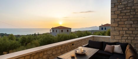 Unwind and soak up the sun on this inviting veranda
