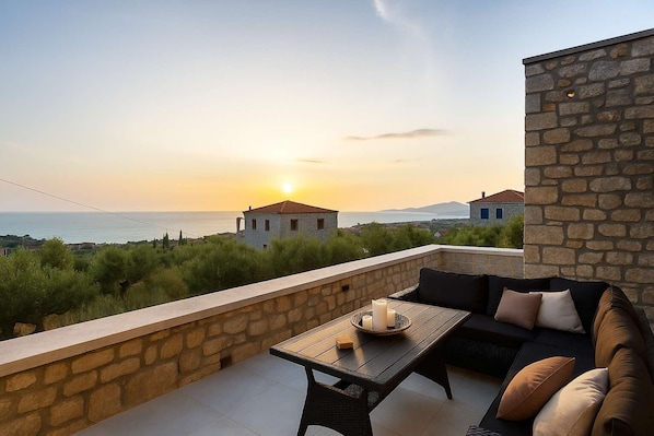 Unwind and soak up the sun on this inviting veranda