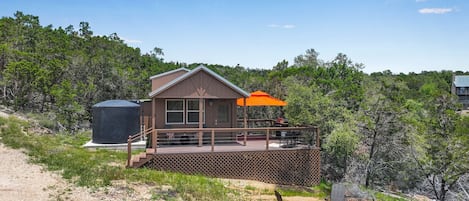 The front of Apline showing the deck and fire pit area.