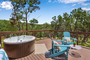 Outdoor bathtub on the deck.