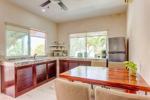 The dining table can also serve as a laptop-friendly workspace
