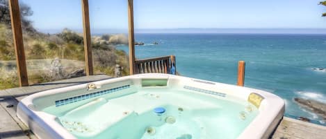 Hot tub with panoramic ocean views