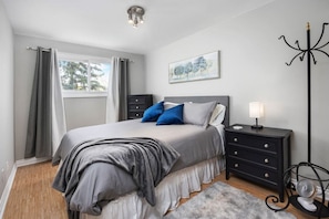 Queen bedroom on the second floor with all new linens and bedding.